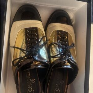 CHANEL Women's Black and Gold Flats